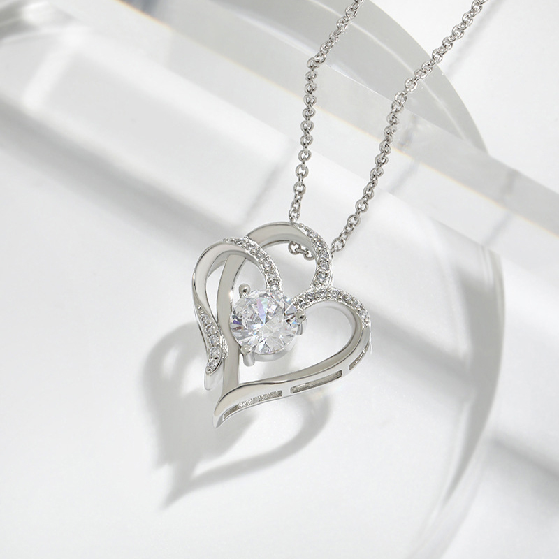 "Dazzling Zircon Double Love Necklace – Rhinestone-inscribed, personalized heart pendant. Perfect Valentine's Day clavicle chain for women."